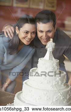 Stock Photo - couple window 
shopping for wedding 
cakes. fotosearch 
- search stock 
photos, pictures, 
images, and photo 
clipart