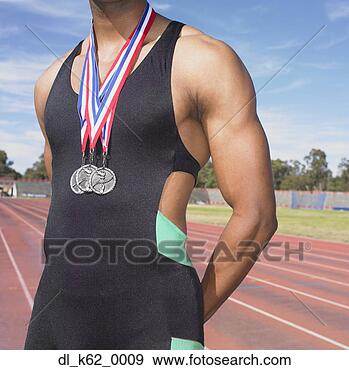Stock Photograph - african male athlete 
with medals, perth, 
australia. fotosearch 
- search stock 
photos, pictures, 
images, and photo 
clipart