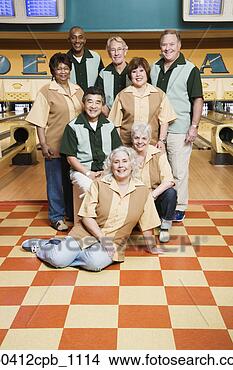 Stock Photo - portrait of a 
group of mature 
men and mature 
women in a bowling 
alley. fotosearch 
- search stock 
photos, pictures, 
images, and photo 
clipart