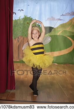 Stock Photo - young girl in 
bee costume on 
stage. fotosearch 
- search stock 
photos, pictures, 
images, and photo 
clipart