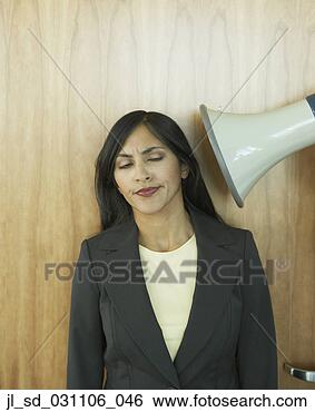 Stock Photo - businesswoman 
being yelled at 
through megaphone. 
fotosearch - search 
stock photos, 
pictures, images, 
and photo clipart