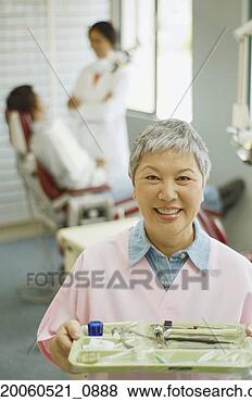 Banco de Imagem - sênior,  asiático, 
 femininas,  dental, 
 assistente,  
sorrindo. fotosearch 
- busca de fotos, 
imagens e clipart