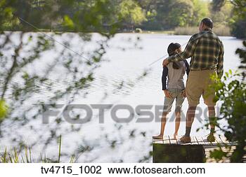 Stock Photo - grandfather and 
granddaughter 
standing on dock. 
fotosearch - search 
stock photos, 
pictures, images, 
and photo clipart