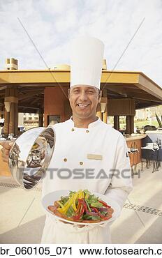 Stock Photography - hispanic male 
chef with plate 
of vegetables, 
los cabos, mexico. 
fotosearch - search 
stock photos, 
pictures, images, 
and photo clipart