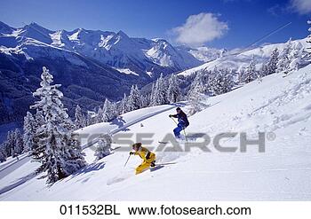 Stock Photo - couple skiing 
in winter landscape. 
fotosearch - search 
stock photos, 
pictures, images, 
and photo clipart