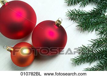 Stock Photo - still life of 
christmas baubles 
and fir branch. 
fotosearch - search 
stock photos, 
pictures, images, 
and photo clipart