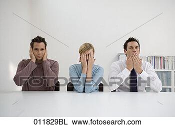 Stock Photo - three office workers 
doing hear no 
evil see no evil 
speak no evil. 
fotosearch - search 
stock photos, 
pictures, images, 
and photo clipart