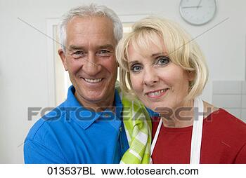 Stock Photo - close-up portrait 
of mature couple 
in kitchen. fotosearch 
- search stock 
photos, pictures, 
images, and photo 
clipart