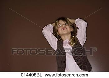 Stock Photo - low angle view 
of happy little 
girl. fotosearch 
- search stock 
photos, pictures, 
images, and photo 
clipart