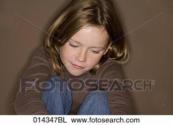 Stock Photo - portrait of blonde 
girl with moody 
look. fotosearch 
- search stock 
photos, pictures, 
images, and photo 
clipart