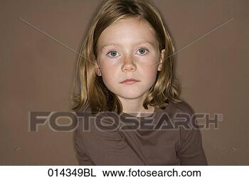 Stock Photo - serious girl looking 
at camera. fotosearch 
- search stock 
photos, pictures, 
images, and photo 
clipart