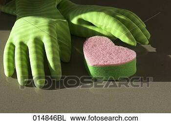 Stock Photo - still life of 
rubber gloves 
and sponge in 
shape of heart. 
fotosearch - search 
stock photos, 
pictures, images, 
and photo clipart