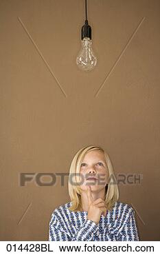 Stock Photo - young boy under 
unlit lightbulb. 
fotosearch - search 
stock photos, 
pictures, images, 
and photo clipart