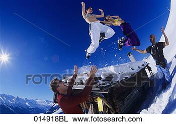 Stock Photo - two young women 
in bikini tops 
jumping from roof 
of alpine hut 
in. fotosearch 
- search stock 
photos, pictures, 
images, and photo 
clipart