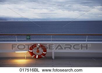 Stock Photo - view from cruise 
ship on ocean 
at twilight. fotosearch 
- search stock 
photos, pictures, 
images, and photo 
clipart