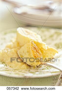 Stock Photo - a sponge cake 
dessert served 
on a china plate. 
fotosearch - search 
stock photos, 
pictures, images, 
and photo clipart