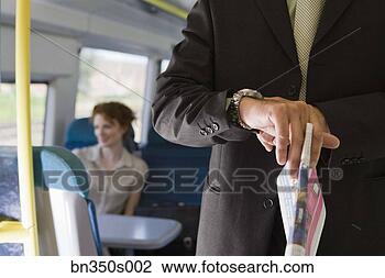 Stock Photo - man checking the 
time. fotosearch 
- search stock 
photos, pictures, 
images, and photo 
clipart