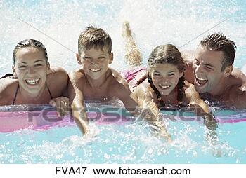 Picture - bathing, aid, 
arms, aquapark, 
airbed, adults. 
fotosearch - search 
stock photos, 
pictures, images, 
and photo clipart