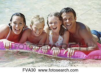 Stock Photography - bathing suit, 
aid, bathing, 
aquapark, airbed, 
adults. fotosearch 
- search stock 
photos, pictures, 
images, and photo 
clipart