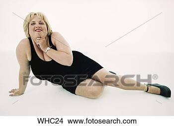 Stock Photo - blonde, chubby, 
buxom, adults. 
fotosearch - search 
stock photos, 
pictures, images, 
and photo clipart