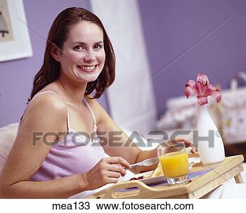Stock Photo - appetite, bed, 
at home, appetizing, 
adults. fotosearch 
- search stock 
photos, pictures, 
images, and photo 
clipart