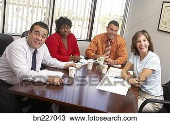 Stock Photo - business team 
at conference. 
fotosearch - search 
stock photos, 
pictures, images, 
and photo clipart