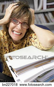 Stock Photo - businesswoman 
stressed out. 
fotosearch - search 
stock photos, 
pictures, images, 
and photo clipart