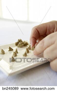 Stock Photograph - person molding 
therapeutic material 
into shapes. fotosearch 
- search stock 
photos, pictures, 
images, and photo 
clipart