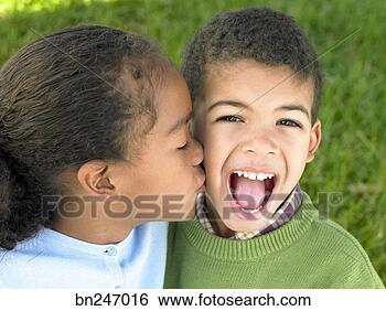 girl-kissing-boy_~bn247016.jpg