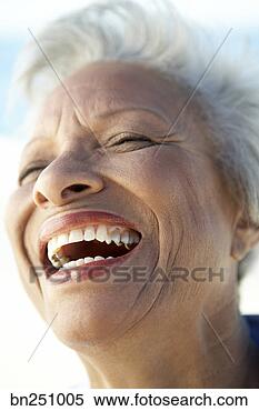Stock Image - laughing woman. 
fotosearch - search 
stock photos, 
pictures, images, 
and photo clipart