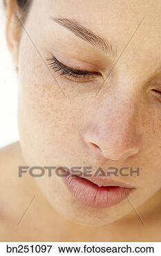 Picture - woman with eyes 
closed. fotosearch 
- search stock 
photos, pictures, 
images, and photo 
clipart