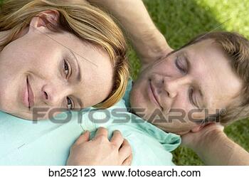 Stock Photo - couple resting. 
fotosearch - search 
stock photos, 
pictures, images, 
and photo clipart
