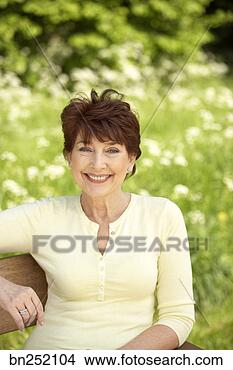 Stock Photo - outdoor portrait 
of woman. fotosearch 
- search stock 
photos, pictures, 
images, and photo 
clipart