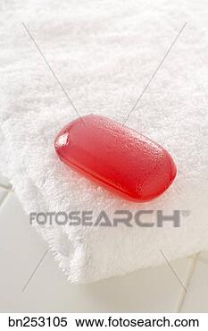 Stock Image - bar of soap with 
bath towel. fotosearch 
- search stock 
photos, pictures, 
images, and photo 
clipart