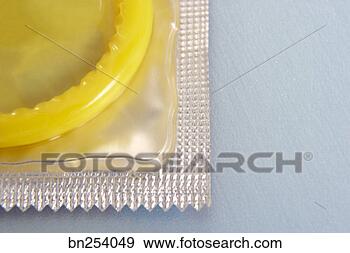Stock Photograph - cropped condom 
in package. fotosearch 
- search stock 
photos, pictures, 
images, and photo 
clipart