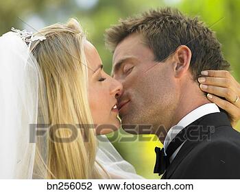 Stock Photo - bride and groom 
kissing. fotosearch 
- search stock 
photos, pictures, 
images, and photo 
clipart