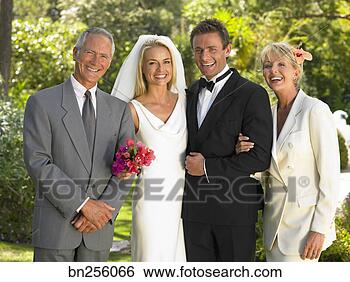 Stock Photo - bride and groom 
with man and woman. 
fotosearch - search 
stock photos, 
pictures, images, 
and photo clipart