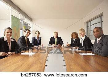 Stock Photo - business team 
at meeting. fotosearch 
- search stock 
photos, pictures, 
images, and photo 
clipart