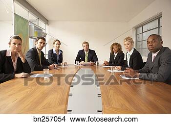 Stock Photo - business team 
at meeting. fotosearch 
- search stock 
photos, pictures, 
images, and photo 
clipart
