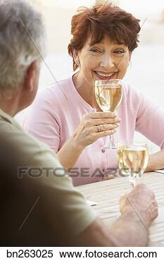 Stock Image - couple drinking 
wine. fotosearch 
- search stock 
photos, pictures, 
images, and photo 
clipart