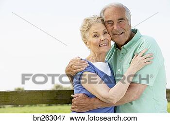 Picture - couple hugging. 
fotosearch - search 
stock photos, 
pictures, images, 
and photo clipart