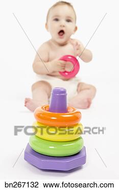 Stock Photo - baby playing with 
toy plastic rings. 
fotosearch - search 
stock photos, 
pictures, images, 
and photo clipart