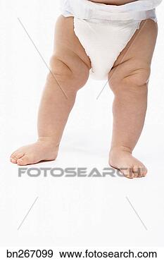 Stock Photograph - standing baby 
in diaper. fotosearch 
- search stock 
photos, pictures, 
images, and photo 
clipart