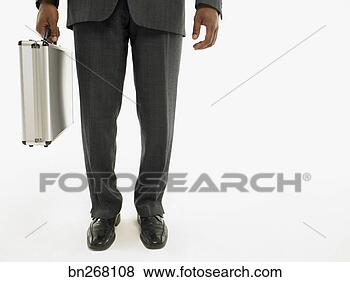 Stock Photo - businessman with 
briefcase. fotosearch 
- search stock 
photos, pictures, 
images, and photo 
clipart