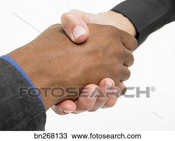 Stock Photo - businessmen shaking 
hands. fotosearch 
- search stock 
photos, pictures, 
images, and photo 
clipart