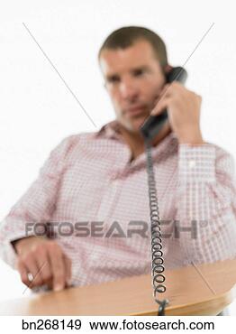 Stock Photograph - man on telephone. 
fotosearch - search 
stock photos, 
pictures, images, 
and photo clipart