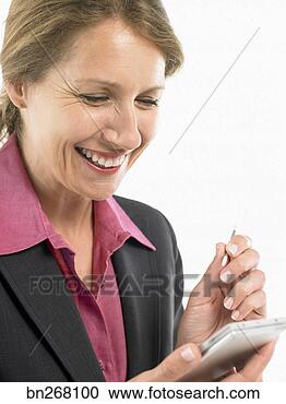 Stock Photography - woman with pda. 
fotosearch - search 
stock photos, 
pictures, images, 
and photo clipart