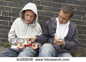 Stock Photo - teenage boys with 
drugs. fotosearch 
- search stock 
photos, pictures, 
images, and photo 
clipart