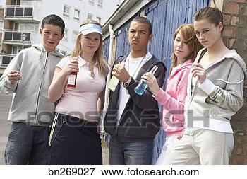 Picture - teenagers with 
alcohol and cigarettes. 
fotosearch - search 
stock photos, 
pictures, images, 
and photo clipart