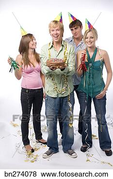 Stock Photo - friends with party 
decorations. fotosearch 
- search stock 
photos, pictures, 
images, and photo 
clipart